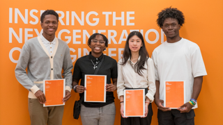 Four students holding certificates who were offered a scholarship from the James Dyson Foundation.