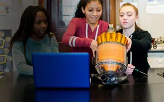 Three students conducting a product analysis.